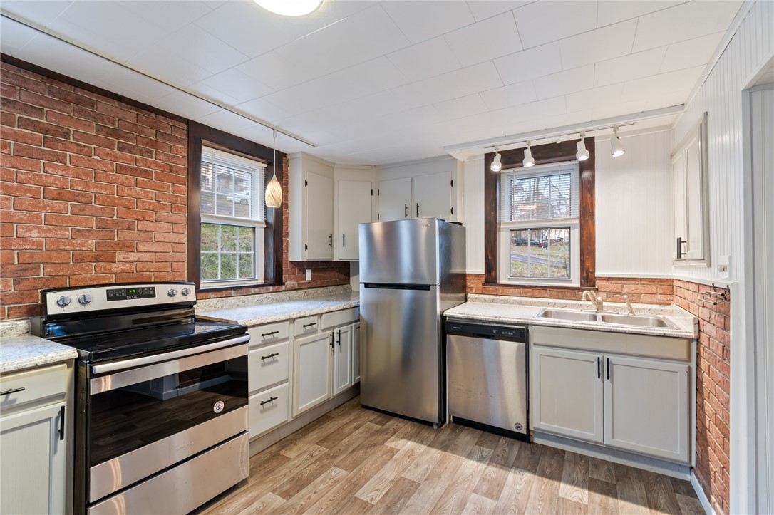21 Maple Street Lyons, NY 14489 - Photo 8 of 37 Updated kitchen and EASY CARE flooring! All applia