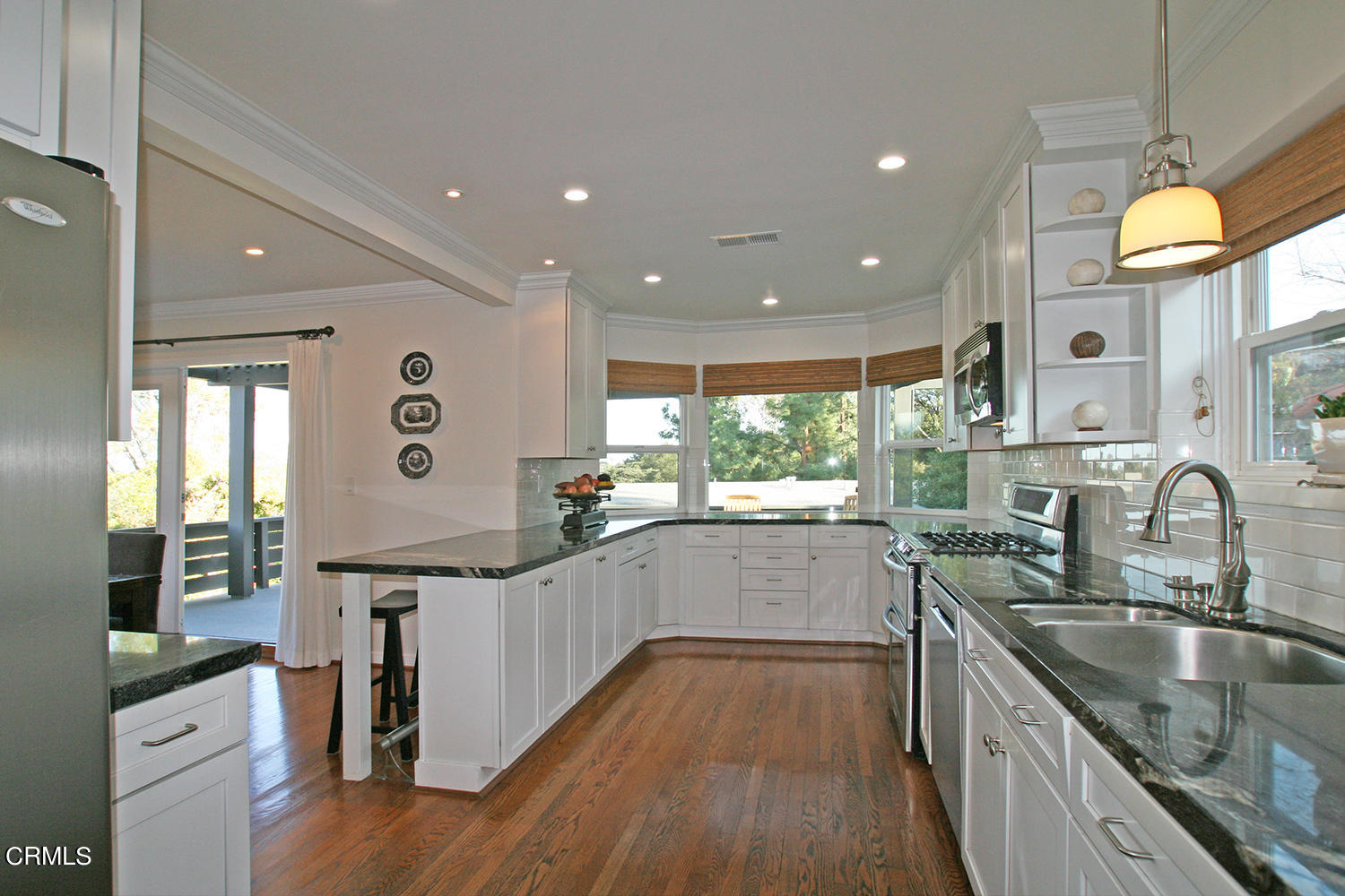 1600 Pleasant Way Pasadena, CA 91105 - Photo 17 of 51 a kitchen with granite countertop a sink and wooden cabinets