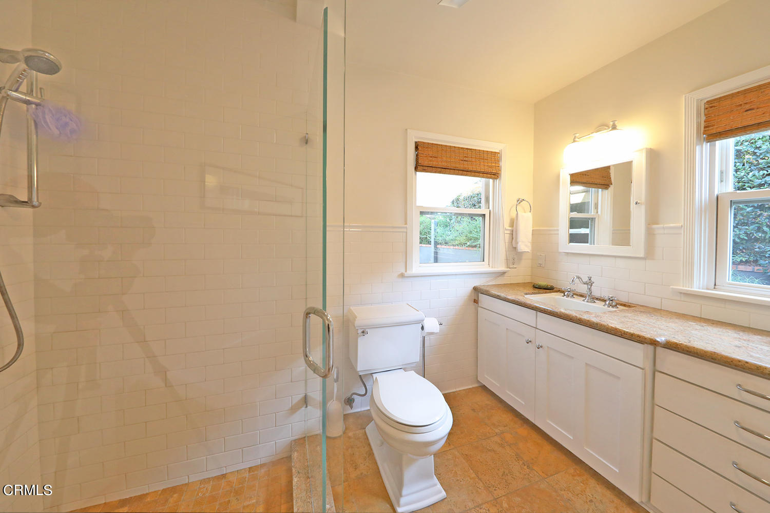 1600 Pleasant Way Pasadena, CA 91105 - Photo 32 of 51 a bathroom with a granite countertop toilet a sink and a window