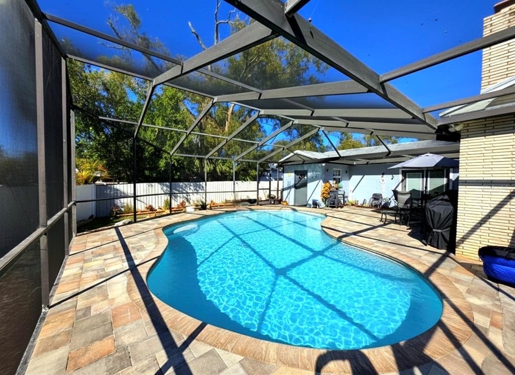6736 Ralston Beach Circle Tampa, FL 33614 - Photo 11 of 37 a view of a swimming pool with a patio