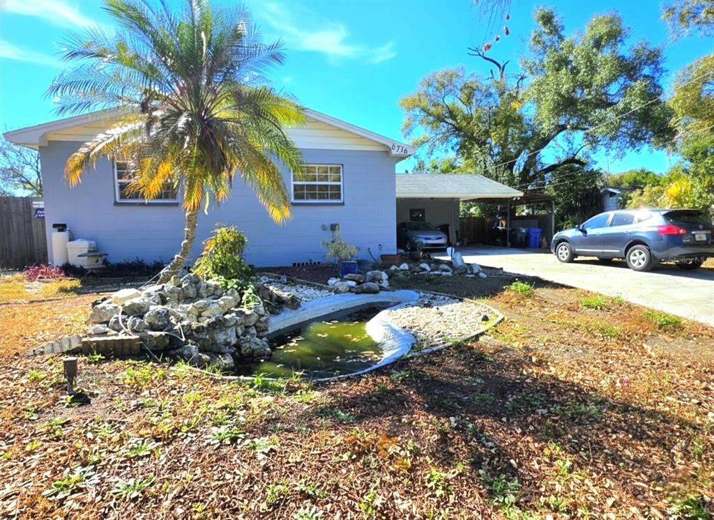 6736 Ralston Beach Circle Tampa, FL 33614 - Photo 2 of 37 a view of a swimming pool with a patio