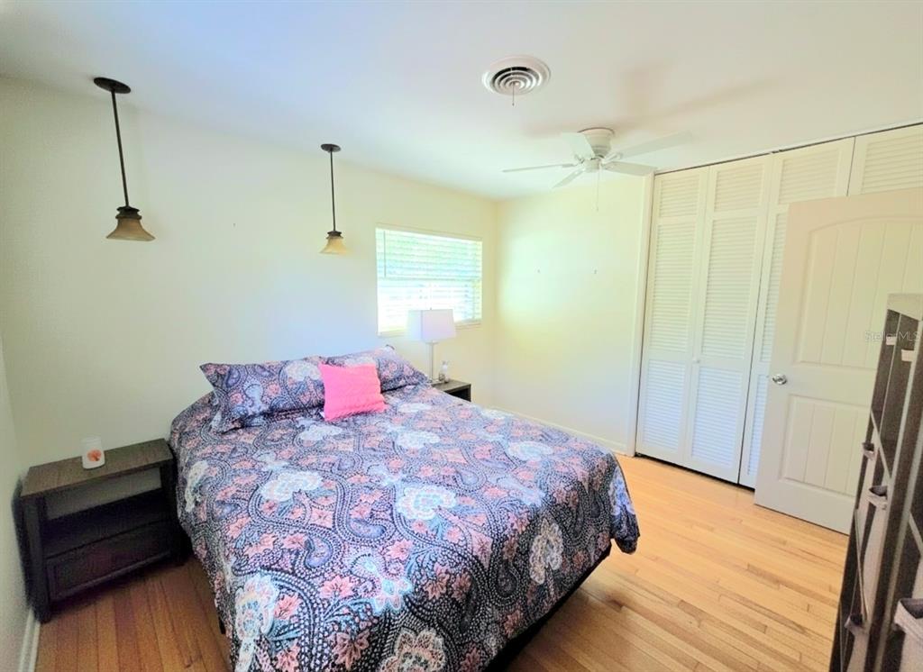 6736 Ralston Beach Circle Tampa, FL 33614 - Photo 21 of 37 a bedroom with a bed and a dresser