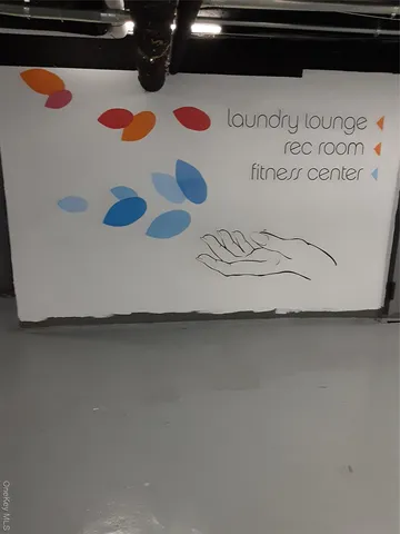 a utility room with multiple furniture and windows