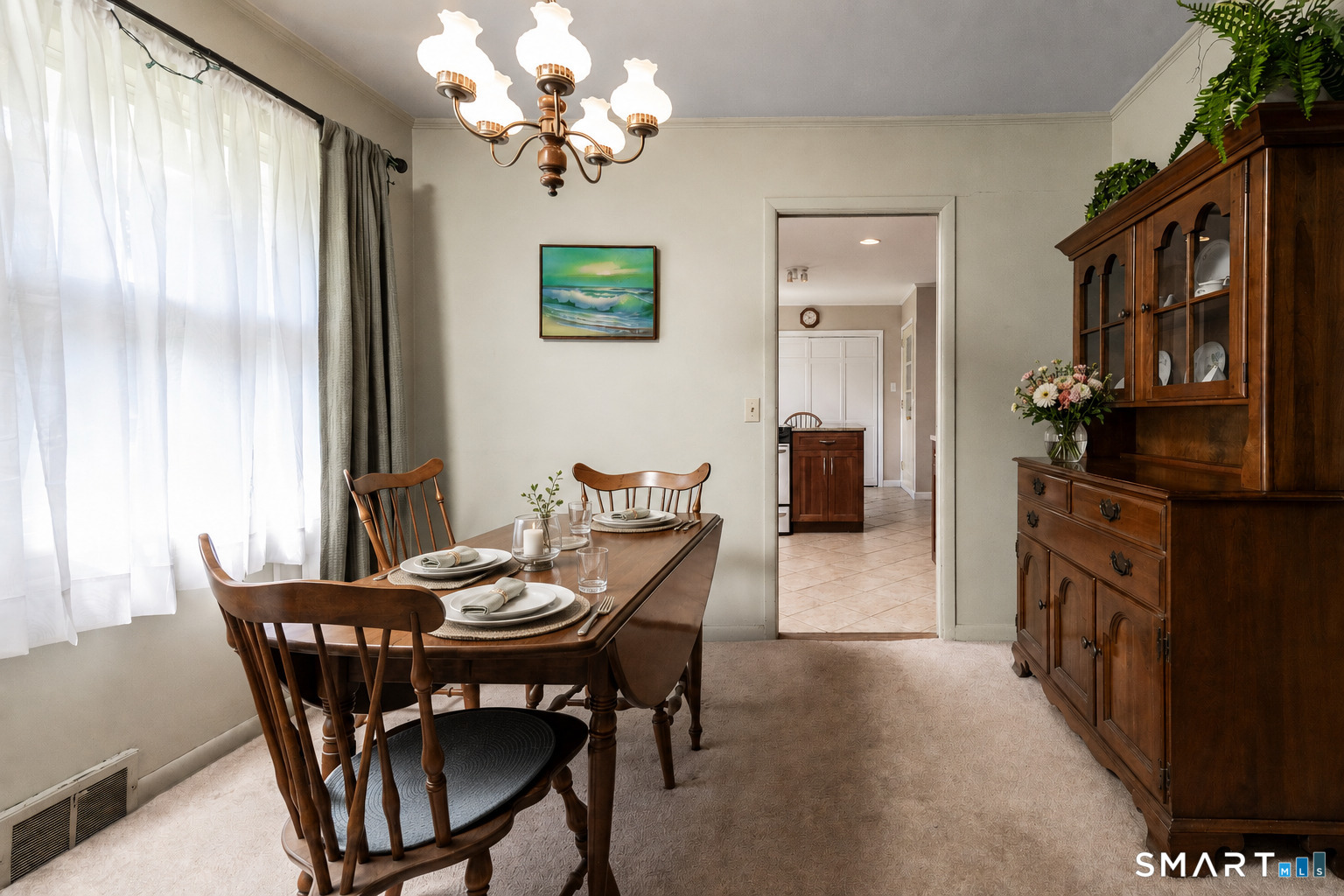 39 Indian Mountain Road Salisbury, CT 06039 - Photo 11 of 16 a view of a dining room with furniture and chandelier