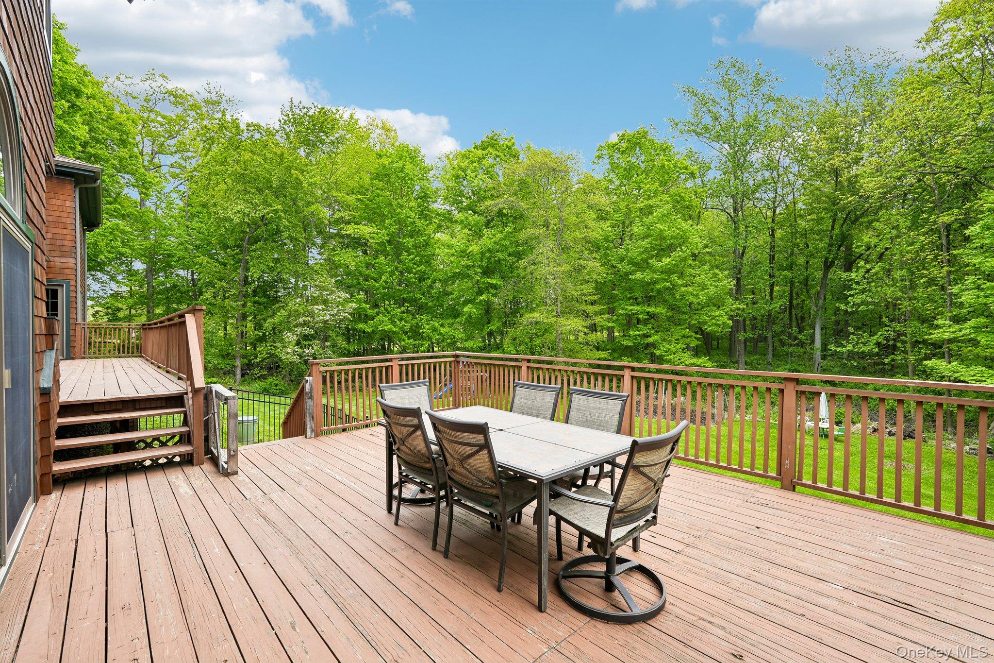 27 Cat Ridge Road North Salem, NY 10560 - Photo 39 of 49 a view of a deck with furniture and wooden floor