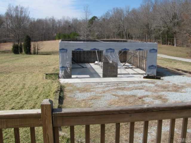 738 Willie Gray Road Timberlake, NC 27583 - Photo 3 of 4 unfinished double car garage