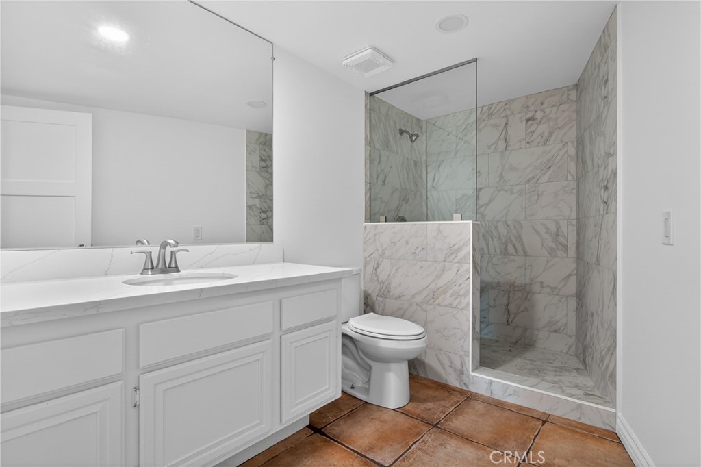 23102 Kimmore Terrace Valencia, CA 91355 - Photo 21 of 45 Downstairs Full Bathroom with step in shower