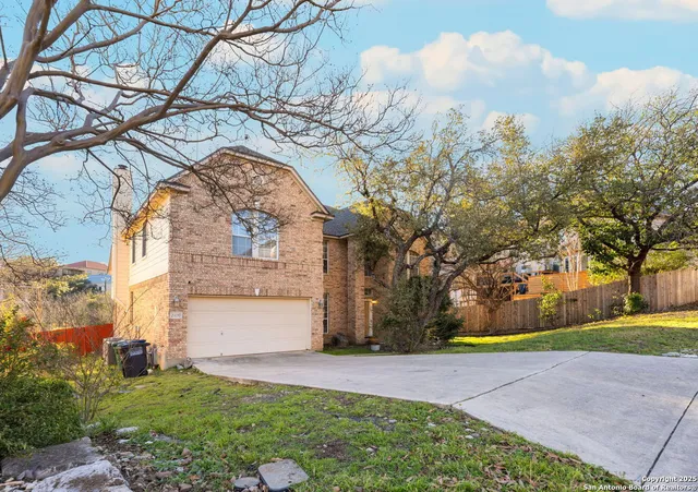 a view of yard along with trees