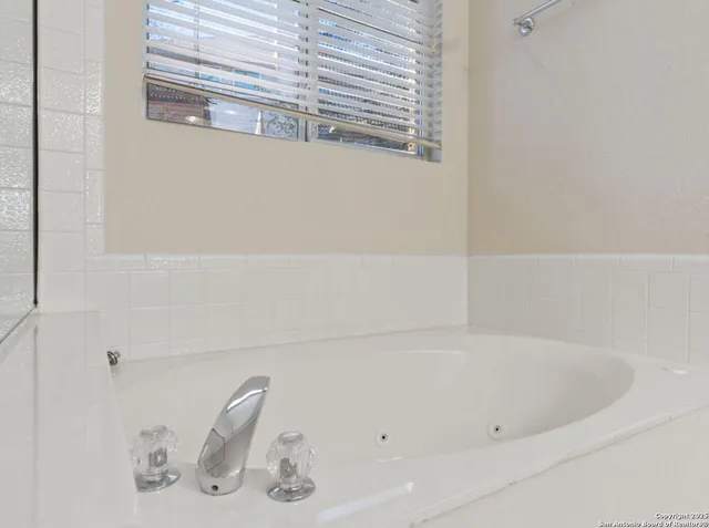 a bathroom with a bathtub