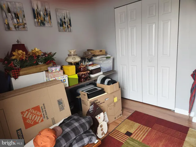 a room with furniture and wooden floor