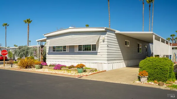 a front view of a house with a garage