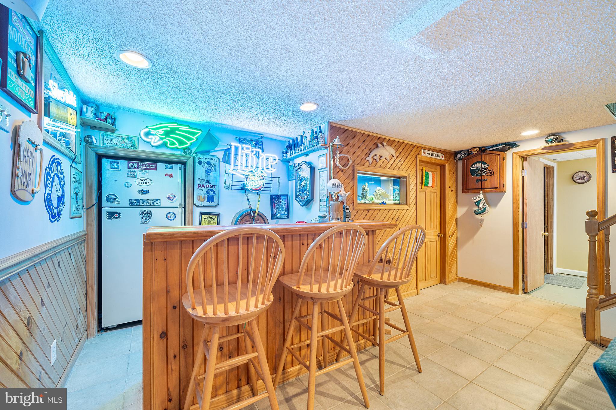 310 Manor Circle Folsom, PA 19033 - Photo 24 of 31 a dining room with furniture and a chandelier