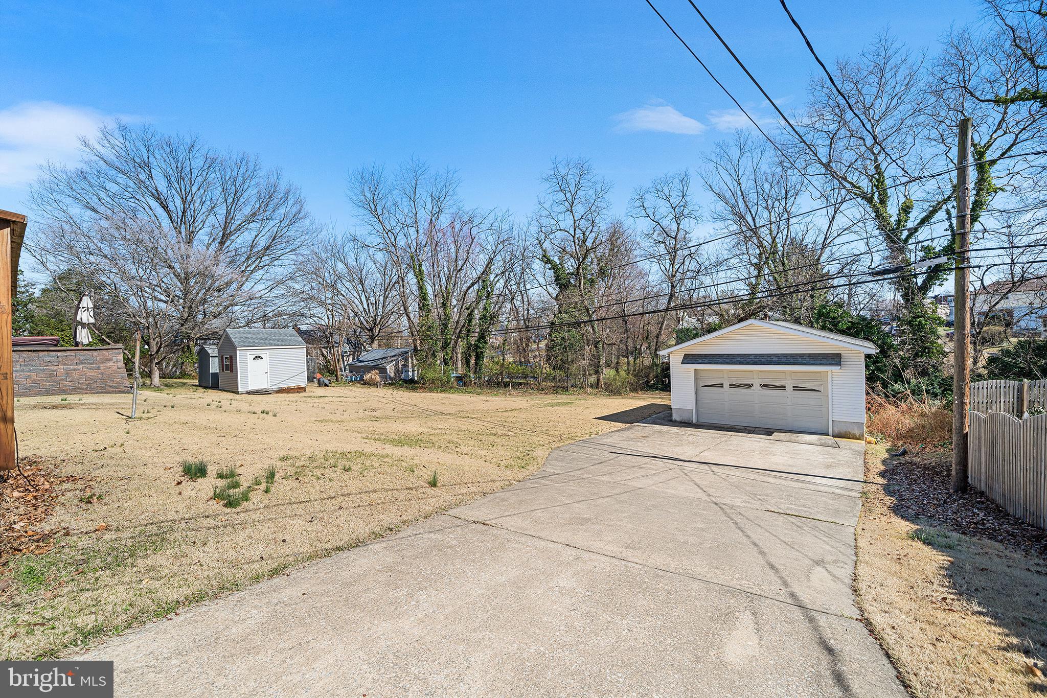 310 Manor Circle Folsom, PA 19033 - Photo 30 of 31 a front view of a house with a yard covered with snow