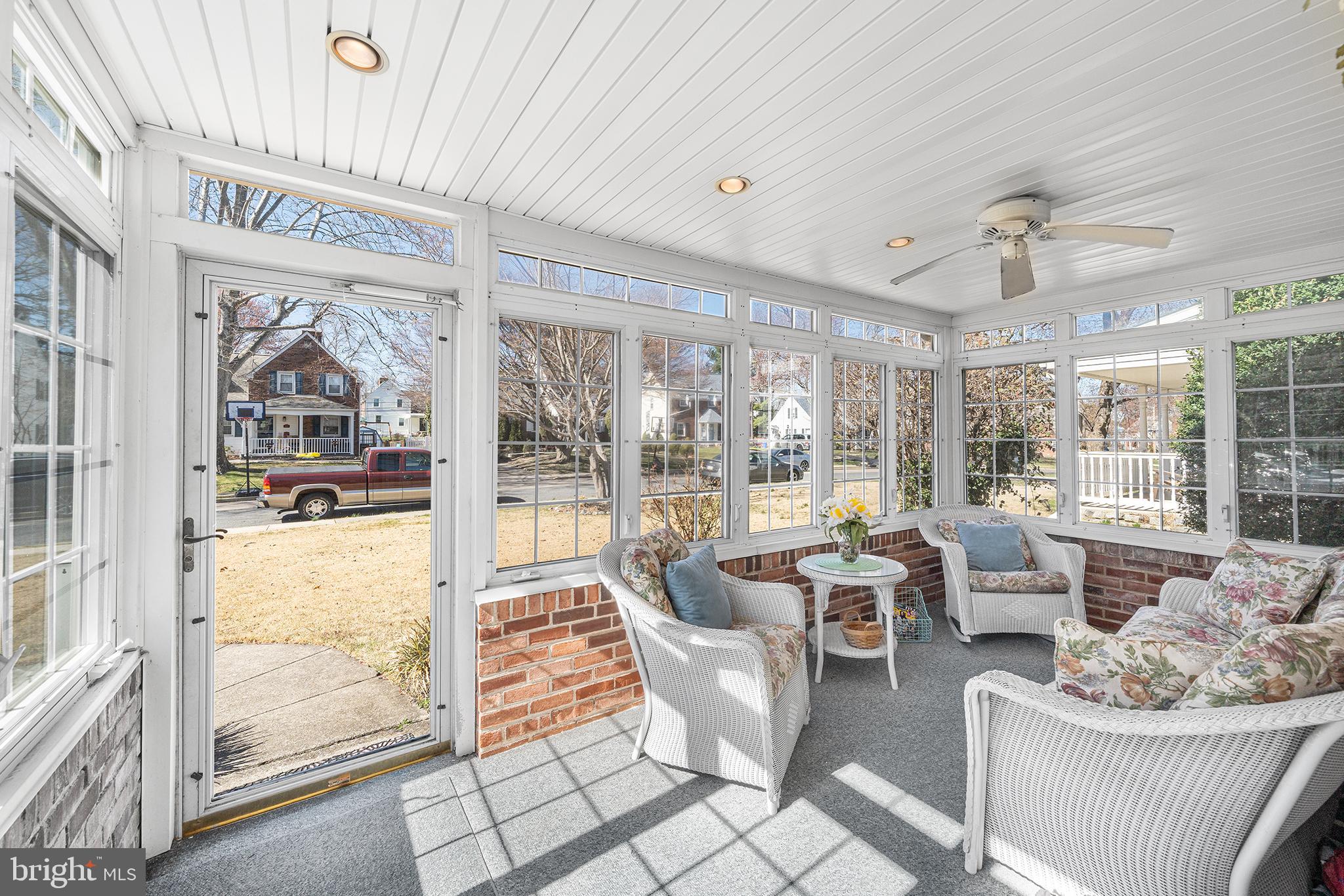 310 Manor Circle Folsom, PA 19033 - Photo 4 of 31 a living room with furniture and a floor to ceiling window