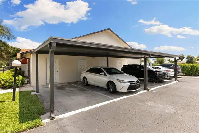 a car parked in front of a house