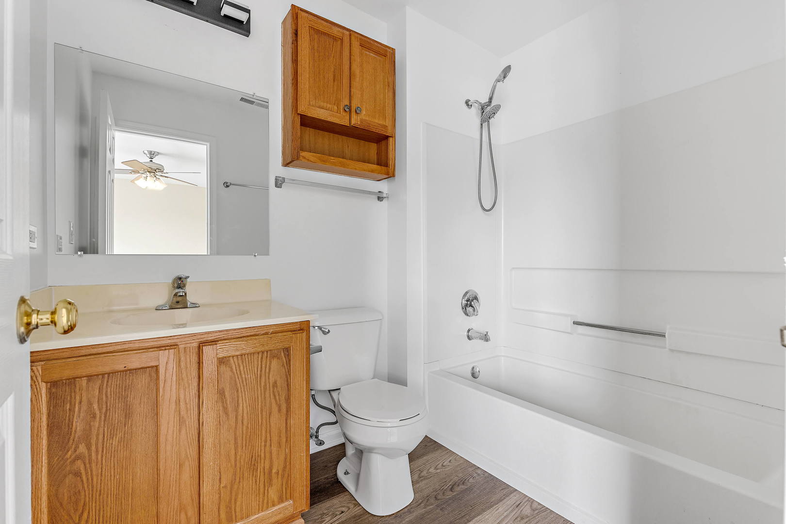 2123 Grayhawk Drive Aurora, IL 60503 - Photo 11 of 18 a bathroom with a sink a toilet and shower