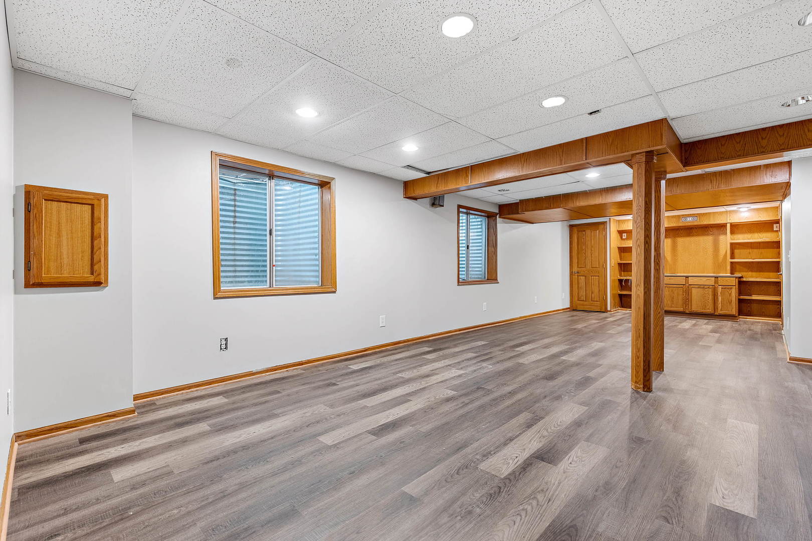 2123 Grayhawk Drive Aurora, IL 60503 - Photo 15 of 18 a view of empty room with wooden floor and fan