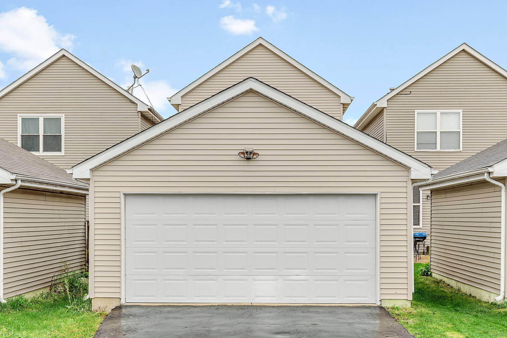 2123 Grayhawk Drive Aurora, IL 60503 - Photo 18 of 18 a view of a house with a yard and garage