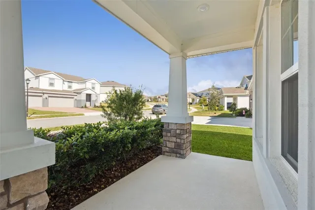 a view of a back yard from a room