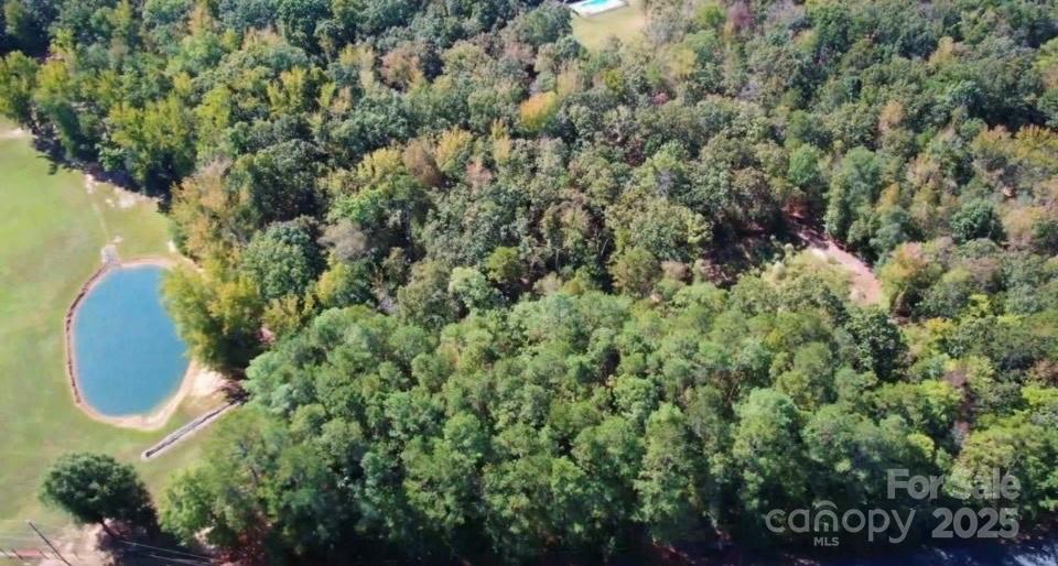 Tbd Steele Road, Unit 5 Waxhaw, NC 28173 - Photo 1 of 9 an aerial view of a residential houses with yard and outdoor space
