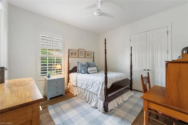 a bed room with a bed and a couch