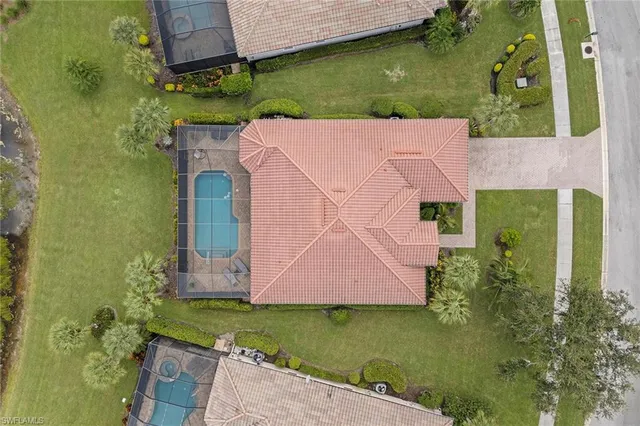 an aerial view of a house with a garden