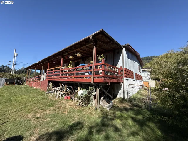a view of a chairs and table in the patio