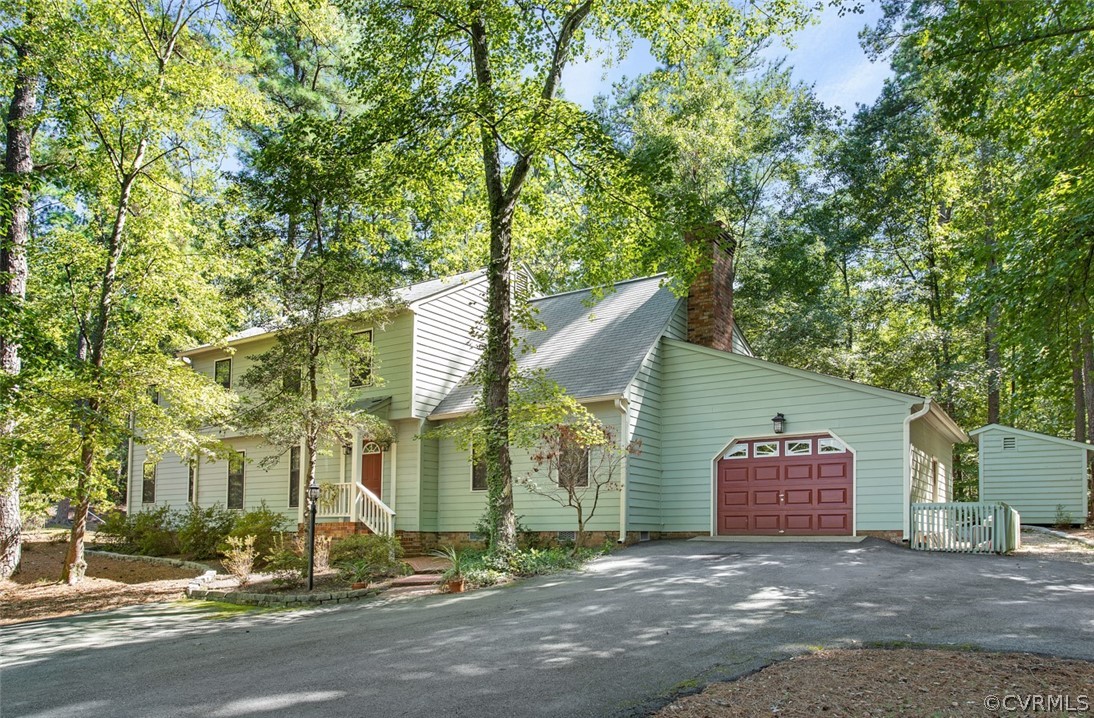 4000 Poplar Grove Road Midlothian, VA 23112 - Photo 2 of 42 a view of a street with houses on both side