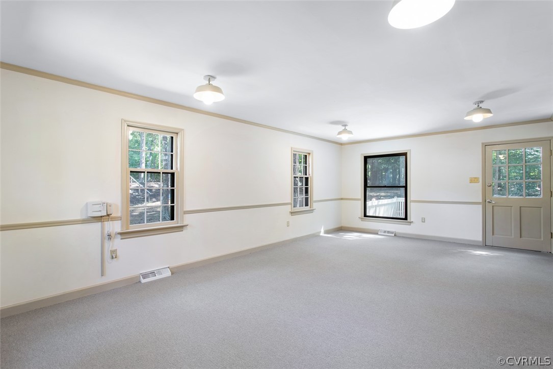 4000 Poplar Grove Road Midlothian, VA 23112 - Photo 23 of 42 a view of a livingroom with an empty space and window