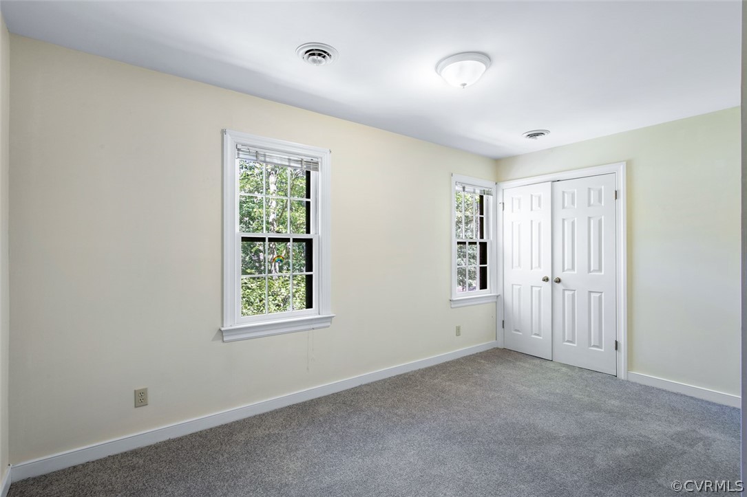 4000 Poplar Grove Road Midlothian, VA 23112 - Photo 29 of 42 an empty room with windows and closet