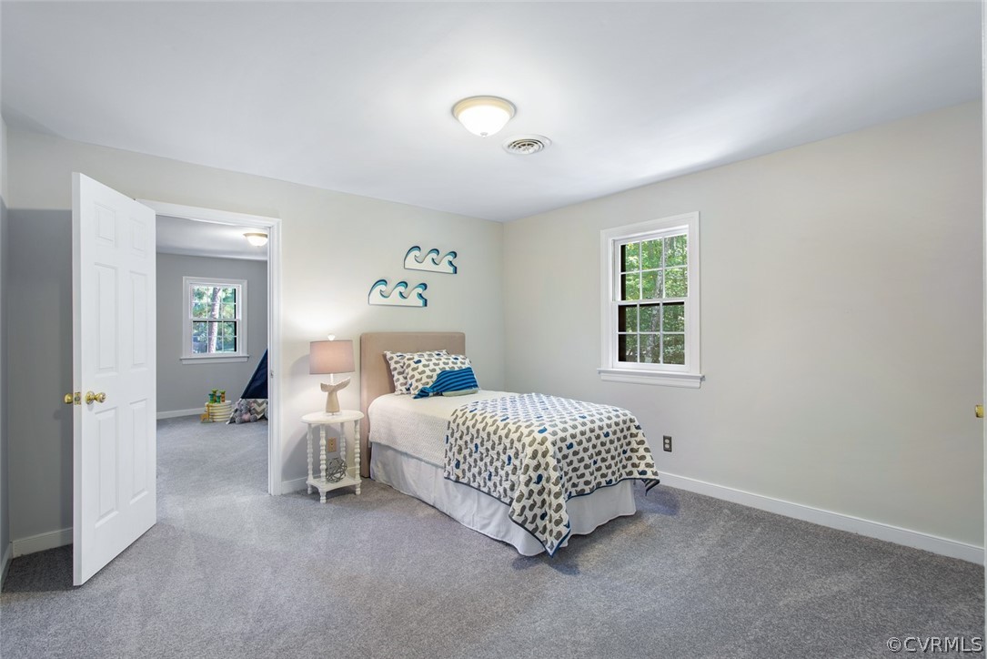 4000 Poplar Grove Road Midlothian, VA 23112 - Photo 31 of 42 a bedroom with bed and a window