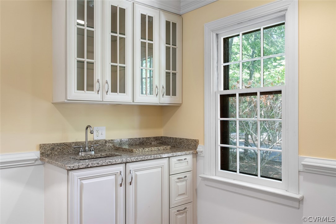 4000 Poplar Grove Road Midlothian, VA 23112 - Photo 10 of 42 a kitchen with stainless steel appliances granite countertop white cabinets and a window