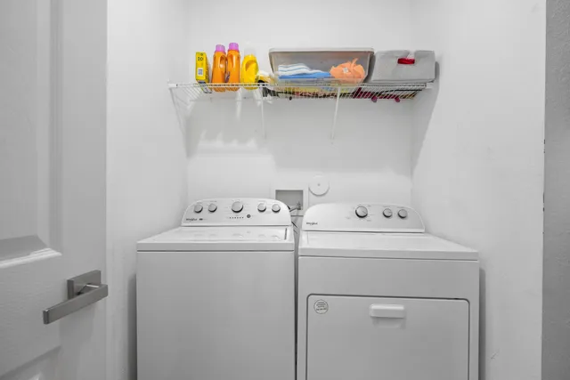 a utility room with dryer and washer