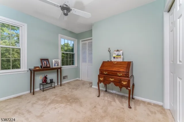 a room with chair and a window