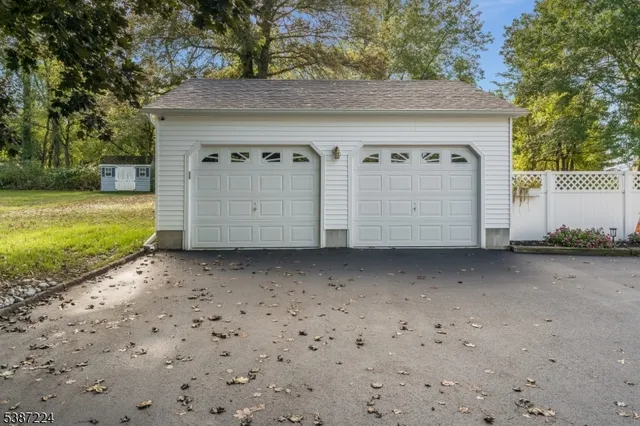 a view of a house with backyard