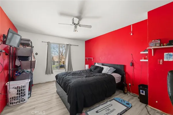 a bedroom with a bed and a closet