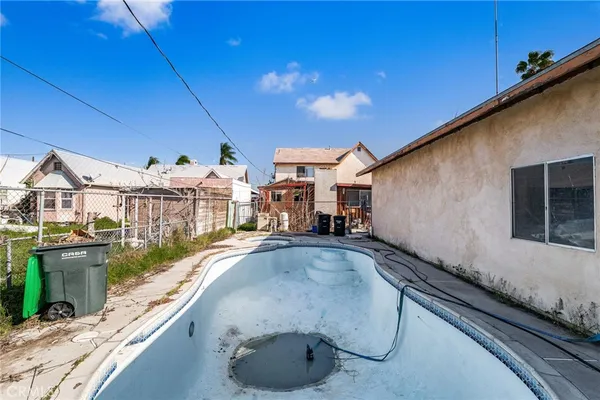 a house view with a backyard space