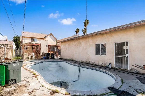 a view of a house with swimming pool