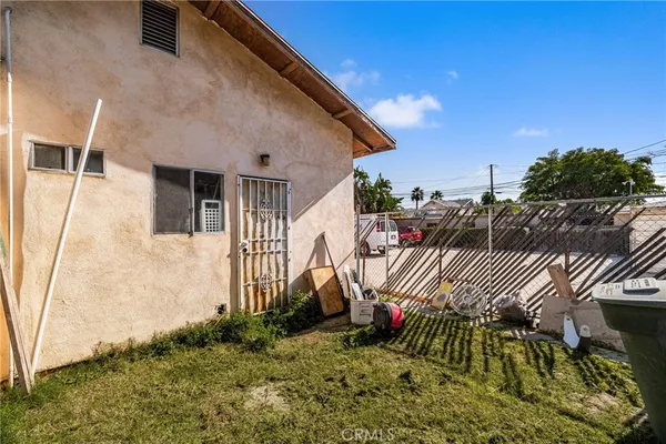 a backyard of a house with seating space