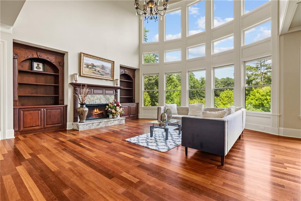 2267 Echo Trail Northeast Atlanta, GA 30345 - Photo 13 of 78 a living room with furniture a window and a flat screen tv