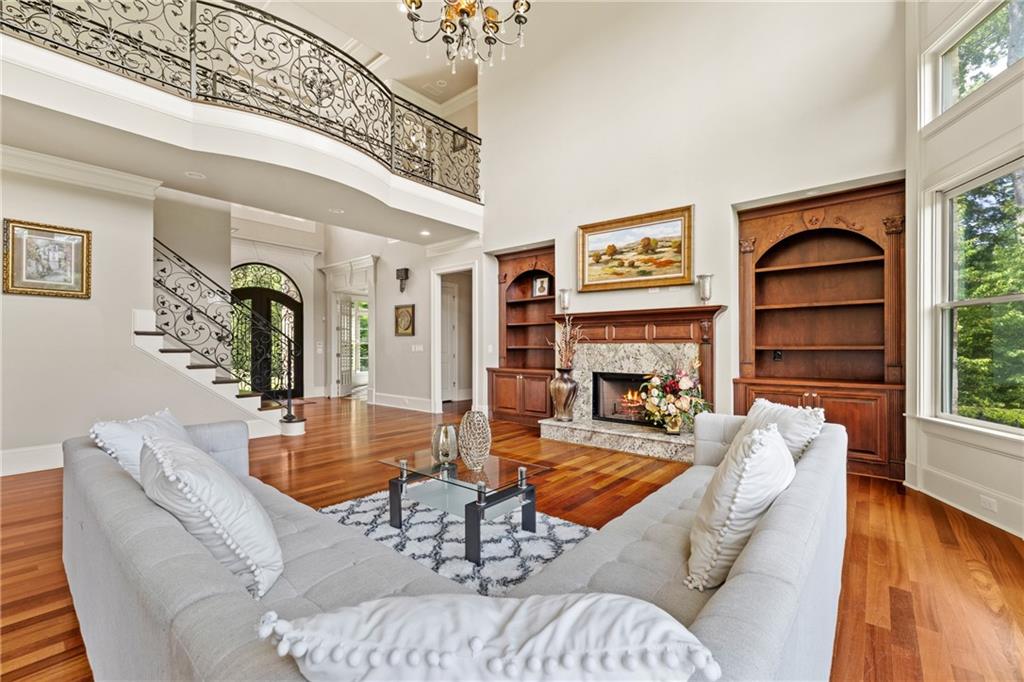 2267 Echo Trail Northeast Atlanta, GA 30345 - Photo 14 of 78 a living room with fireplace furniture and a large window