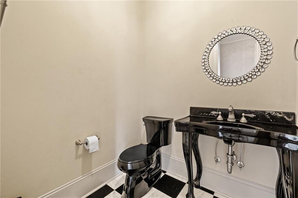 2267 Echo Trail Northeast Atlanta, GA 30345 - Photo 28 of 78 a close view of a sink and a stove with wooden floor