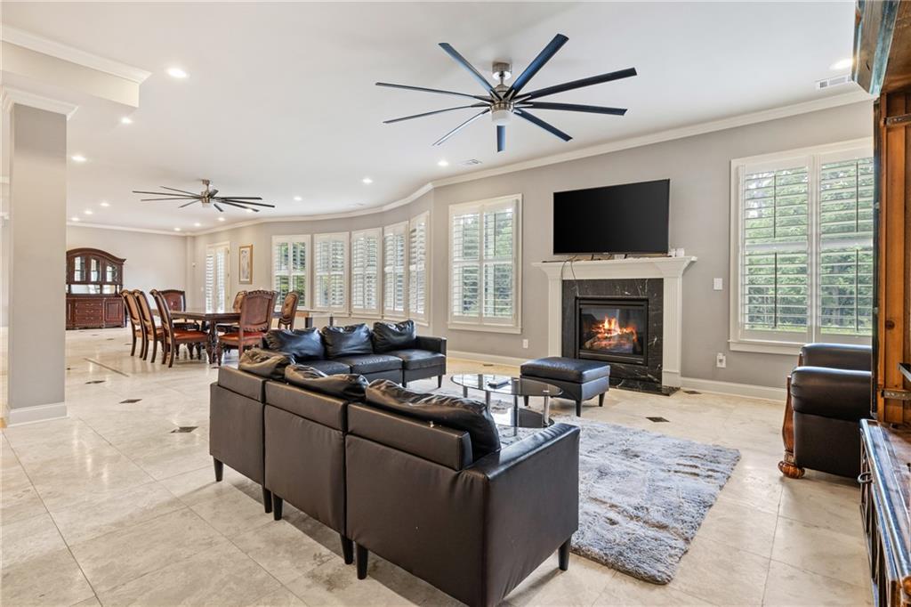 2267 Echo Trail Northeast Atlanta, GA 30345 - Photo 57 of 78 a living room with furniture fireplace and a flat screen tv