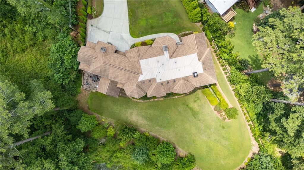 2267 Echo Trail Northeast Atlanta, GA 30345 - Photo 73 of 78 a view of a swimming pool with a yard and large trees
