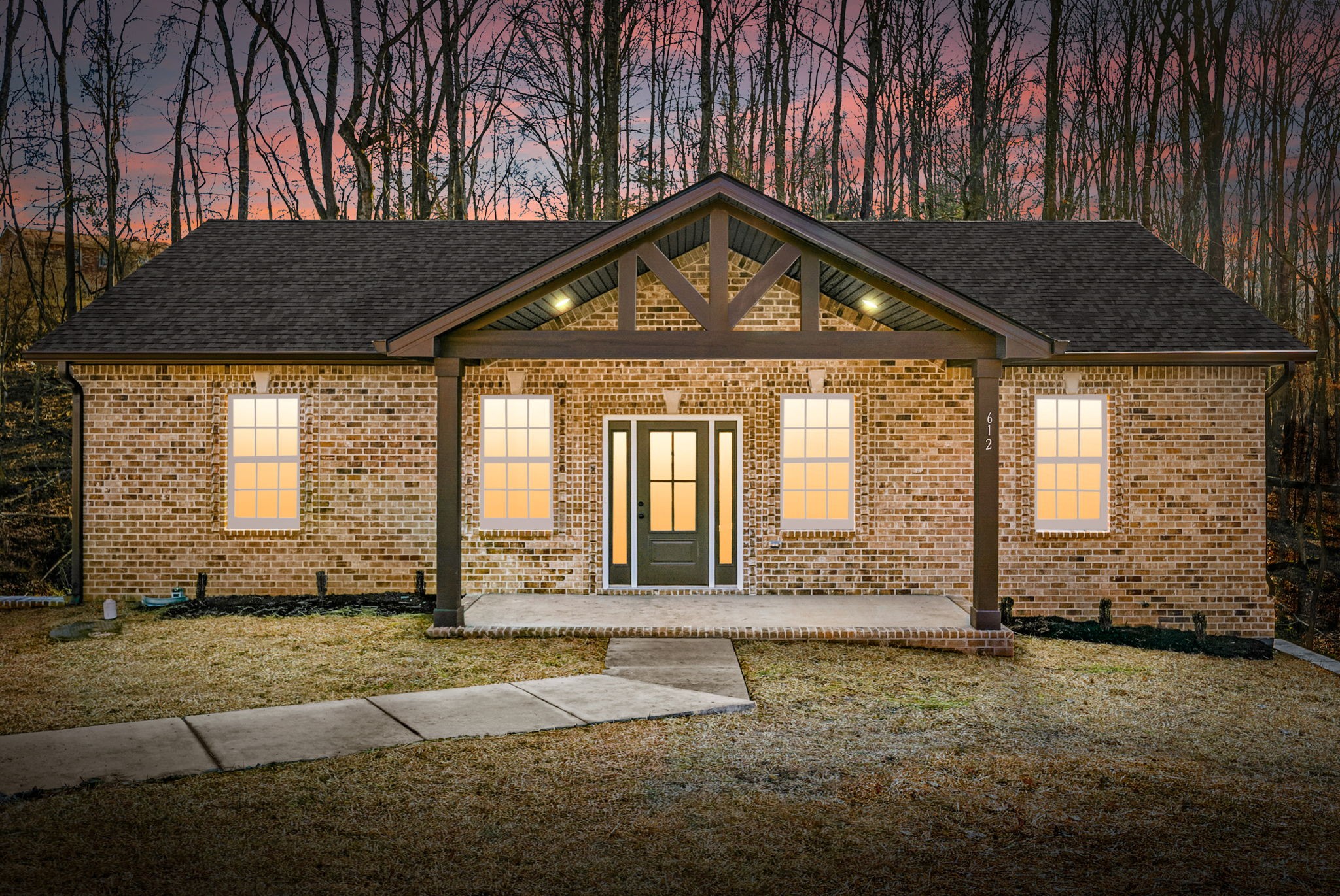 612 Hill Road Clarksville, TN 37040 - Photo 1 of 44 a front view of a house with a yard