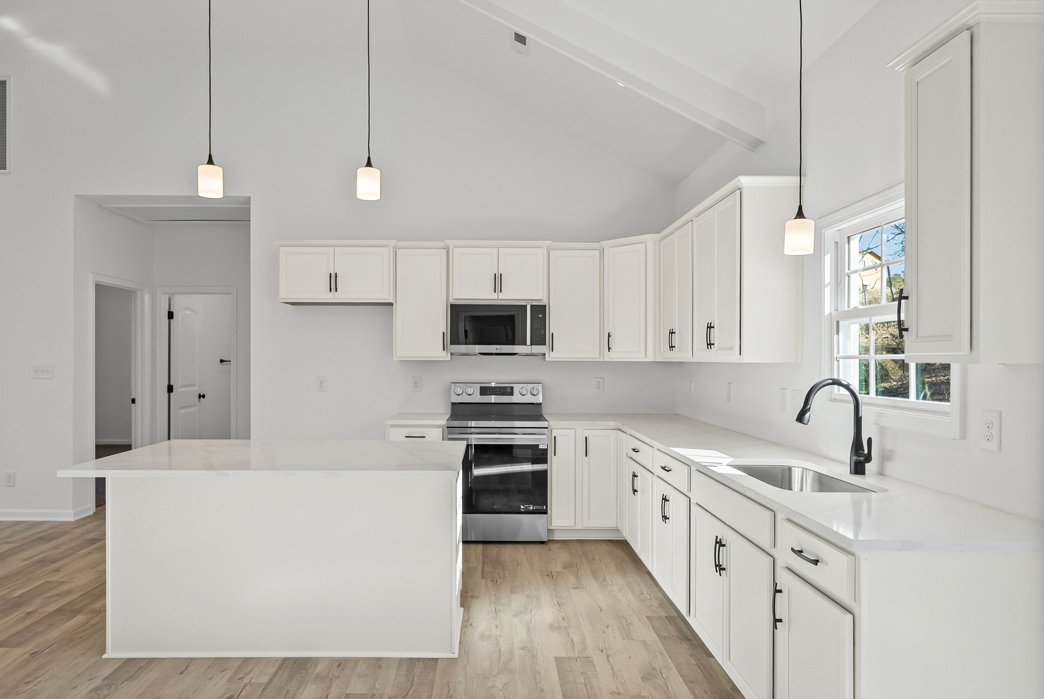 612 Hill Road Clarksville, TN 37040 - Photo 14 of 44 a kitchen with stainless steel appliances white cabinets a sink a stove a refrigerator and cabinets