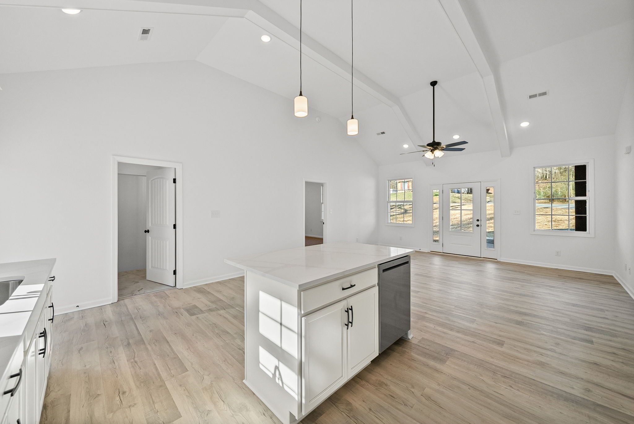 612 Hill Road Clarksville, TN 37040 - Photo 15 of 44 a kitchen with a stove a window and wooden floors