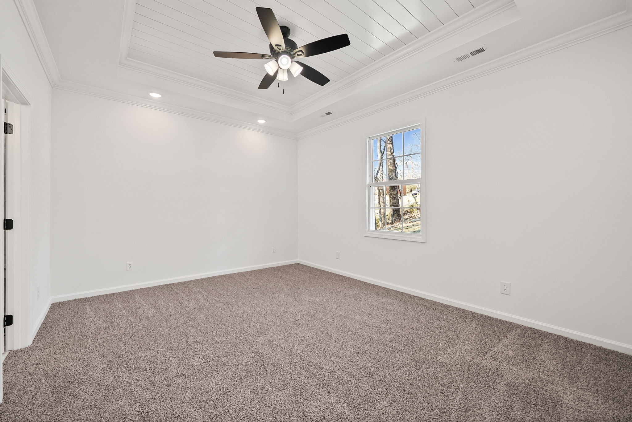 612 Hill Road Clarksville, TN 37040 - Photo 17 of 44 an empty room with a chandelier fan and windows