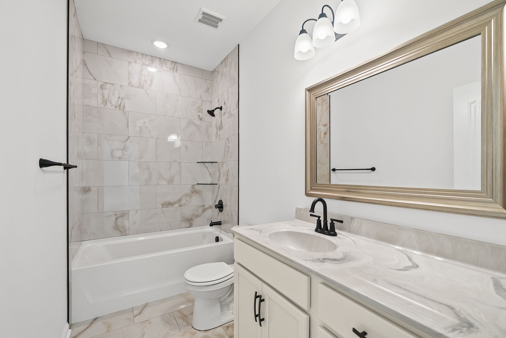 612 Hill Road Clarksville, TN 37040 - Photo 26 of 44 a bathroom with a granite countertop sink a toilet a mirror and shower
