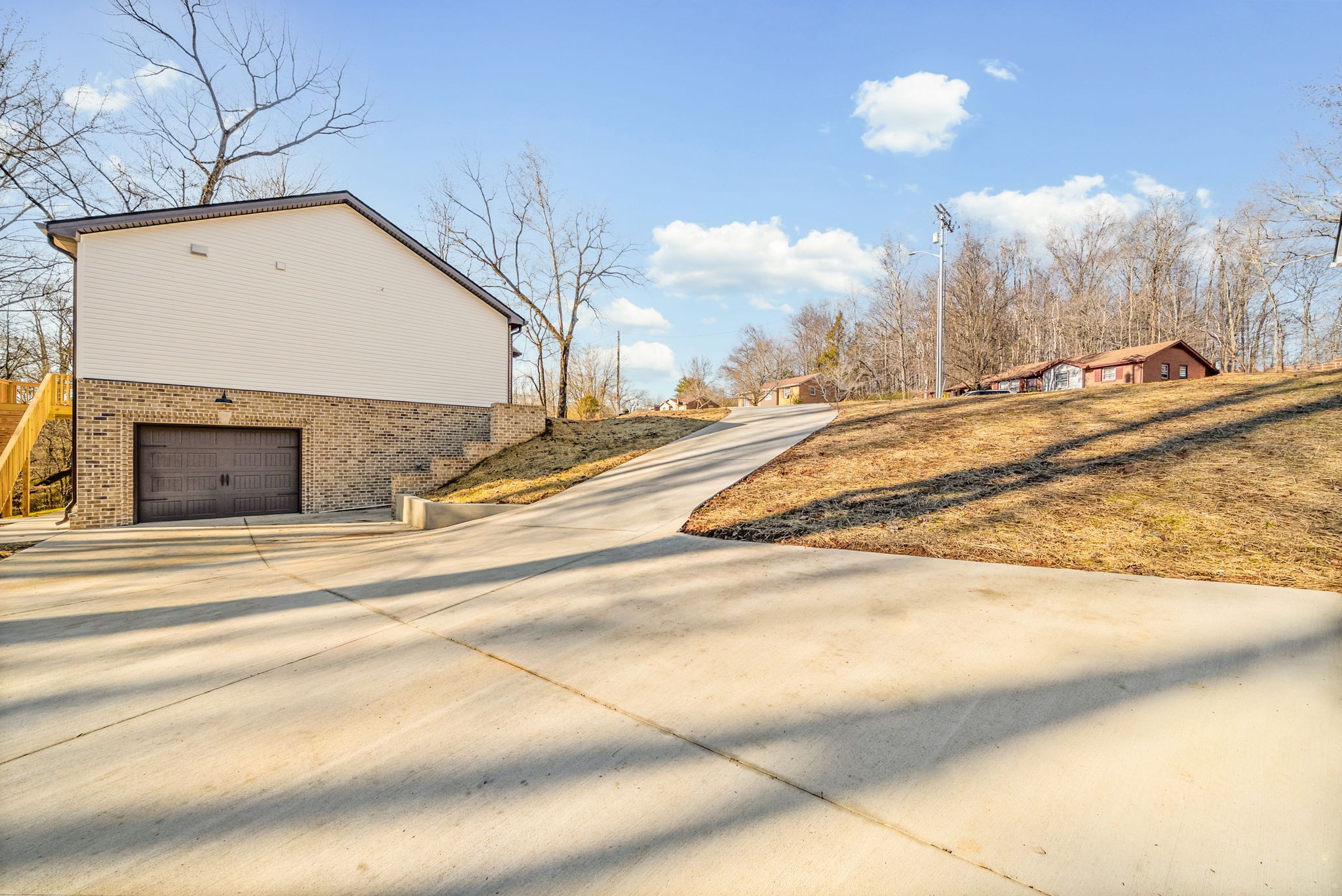 612 Hill Road Clarksville, TN 37040 - Photo 38 of 44 a view of a house with a snow on the road